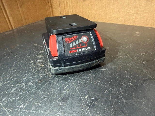 Milwaukee M18 CP2.0 battery latched into a Keepfast battery holder