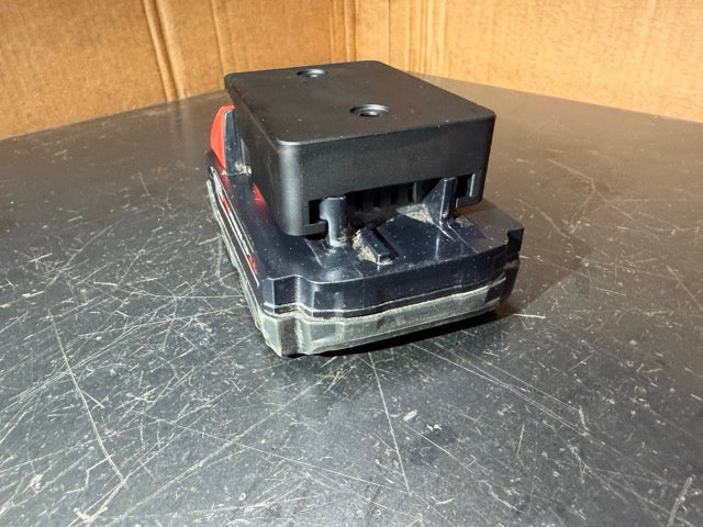 Milwaukee M18 XC battery in a Keepfast battery holder