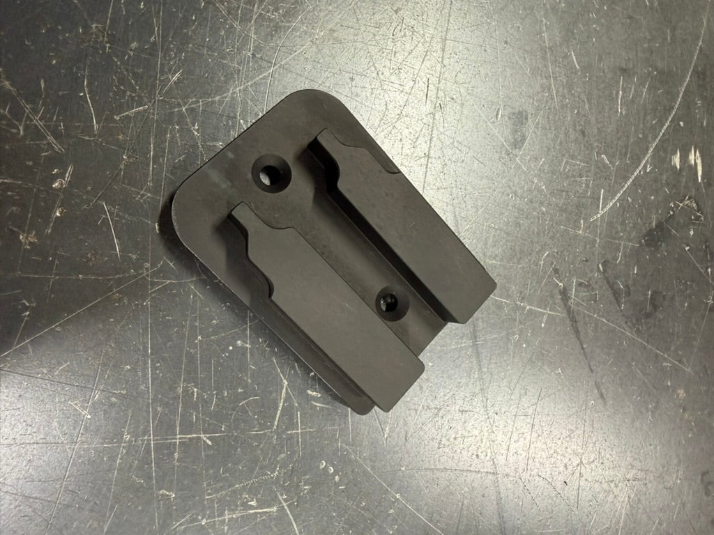 Keepfast tool holder for DeWalt 20V, angled view of the stepped rails